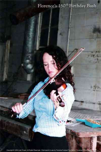 Natalie Harward plays fiddle at the Florence Mill.